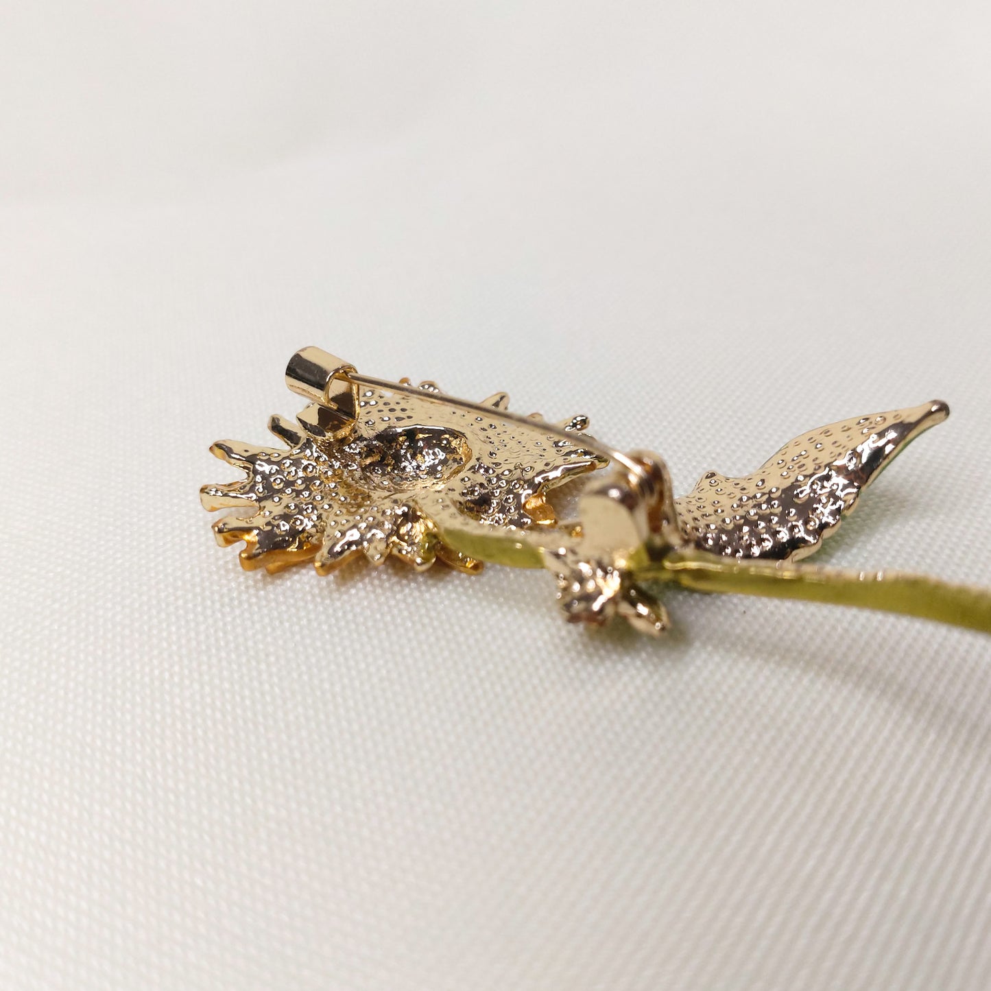 Broche girassol