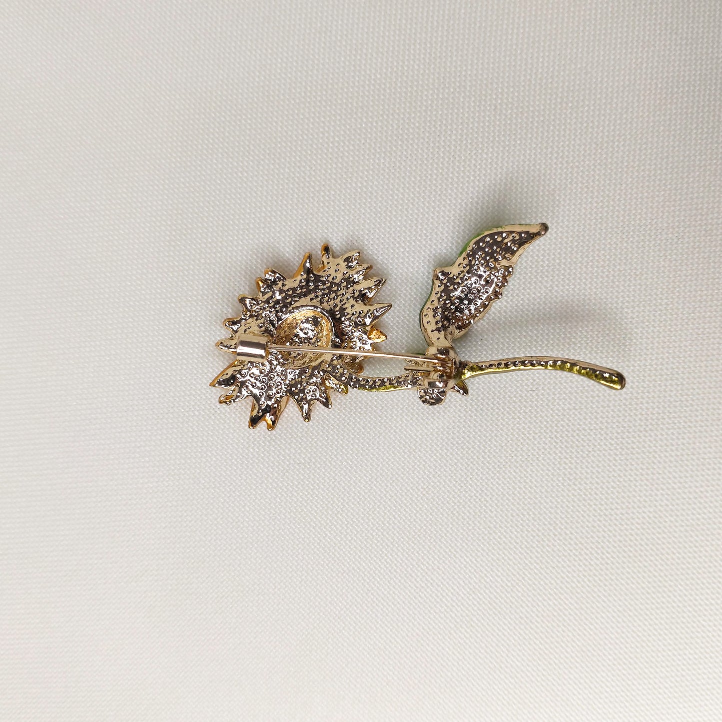 Broche girassol