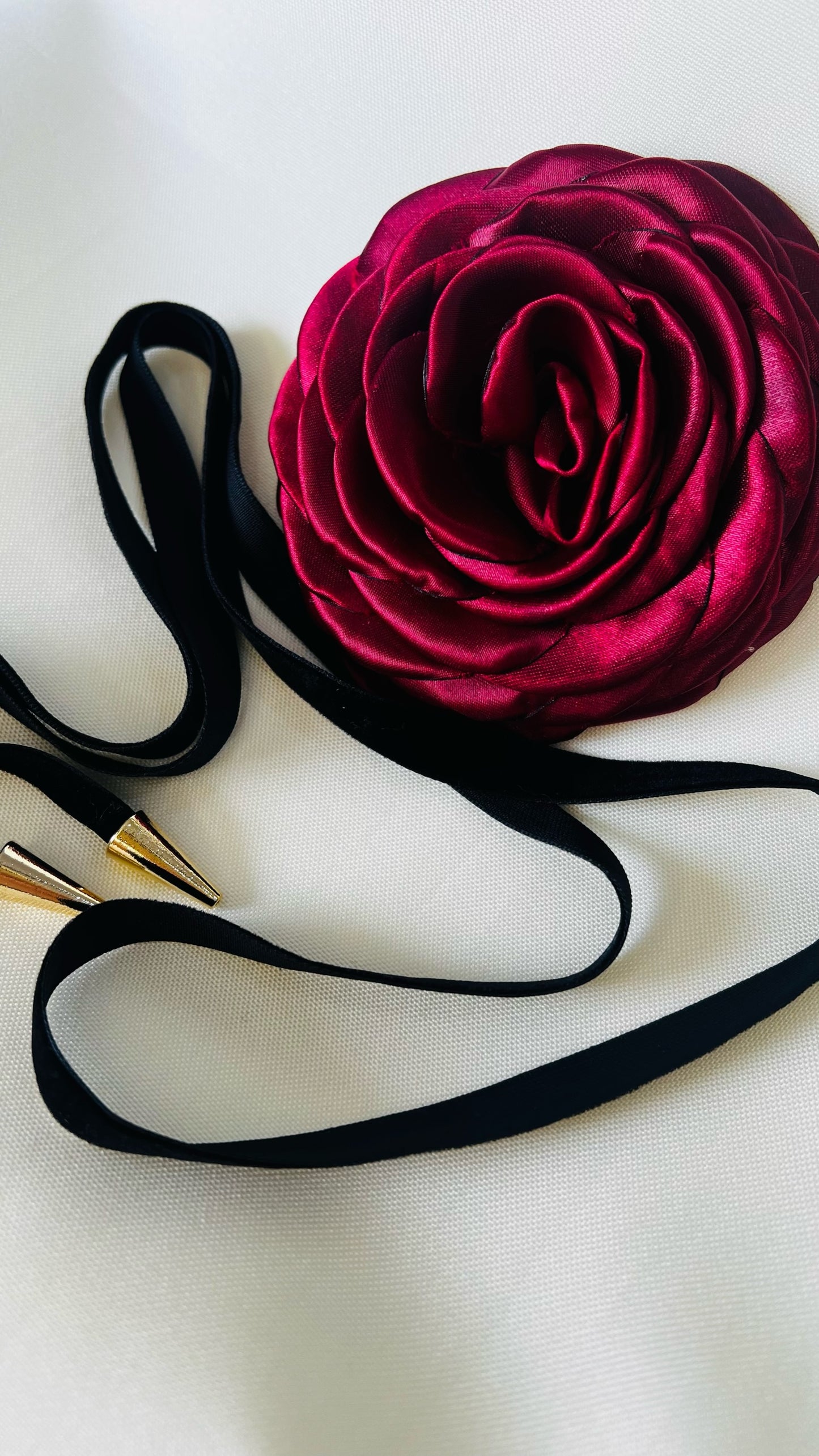 Flores broche marsala